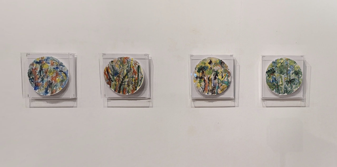 several paintings on display — Biophilia & Art exhibition